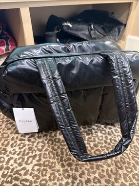 Calpack nwt
Sold out Luka glazed blk duffel